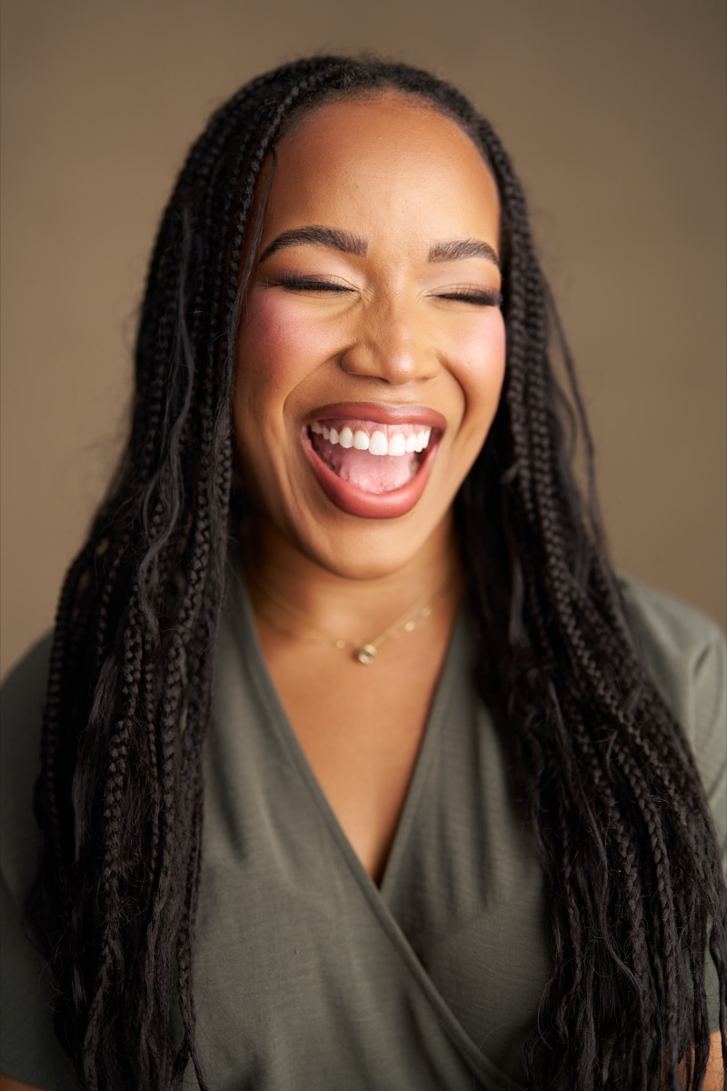 Eboni laughing during a portrait session